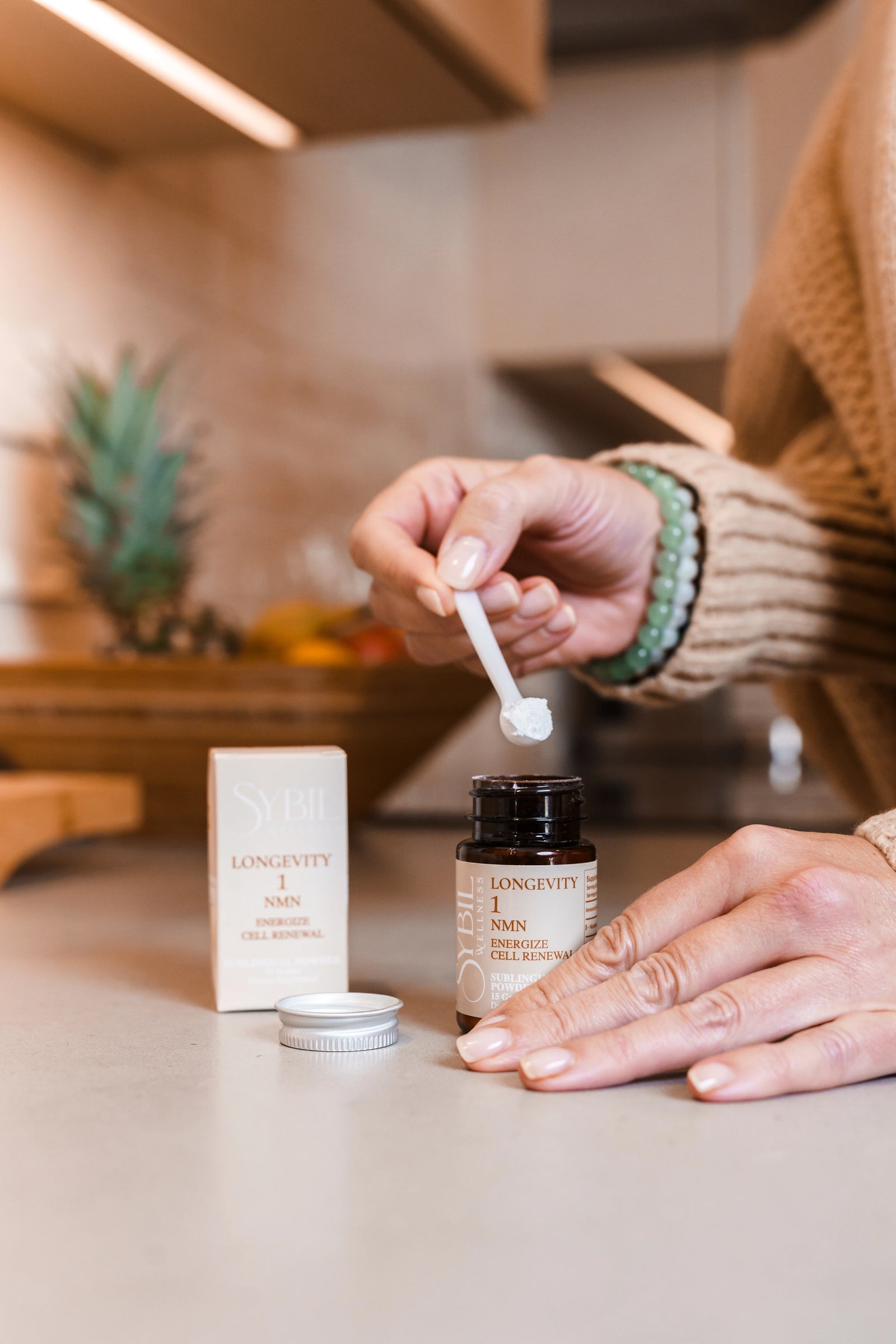 Woman taking her Sybil supplement in soft morning light